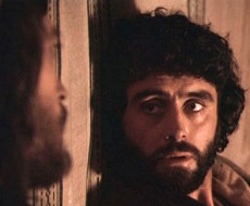 Judas looks at Jesus, scene from a film of the Life of Jesus